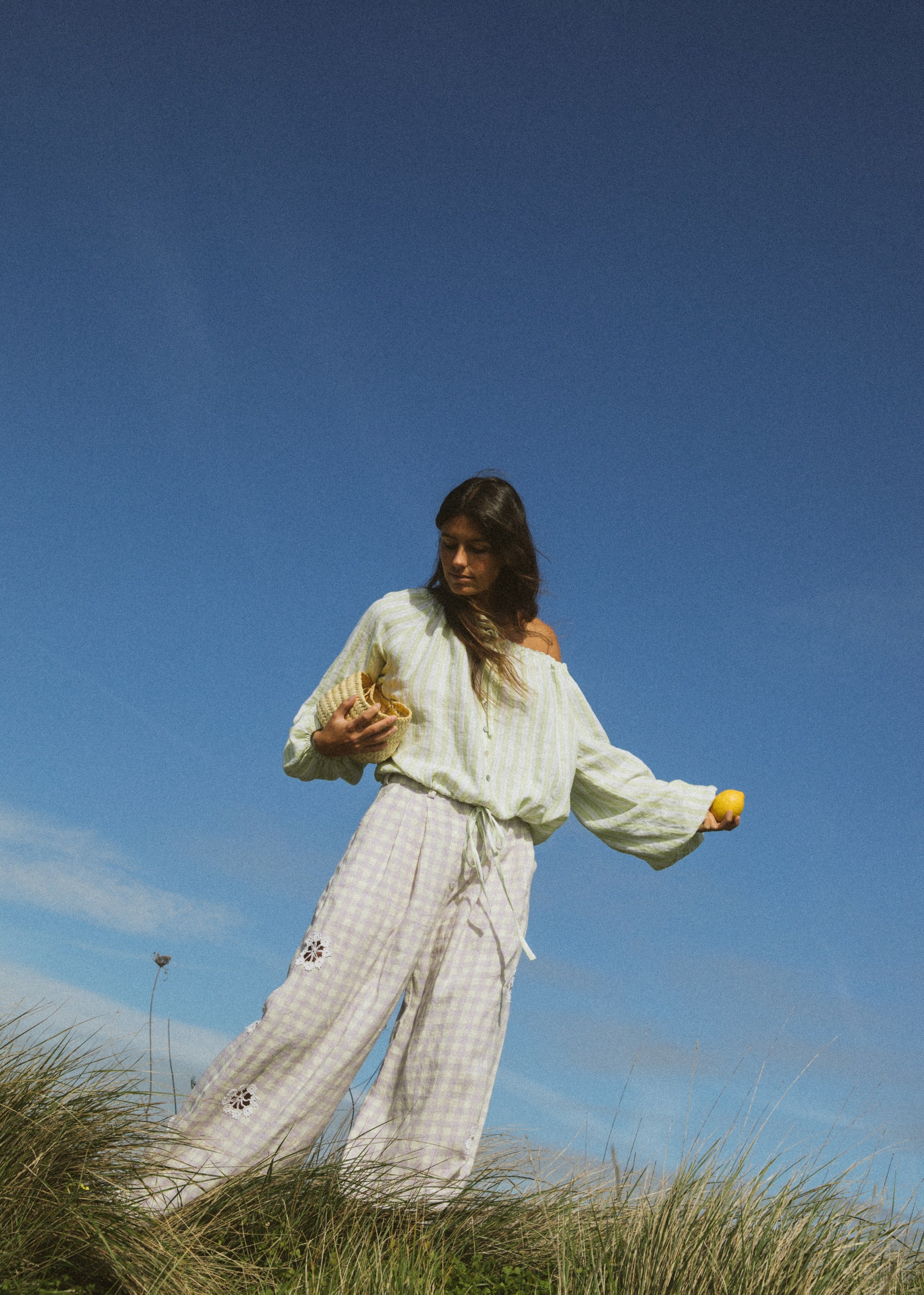 Checkered linen pants with crocheted flowers